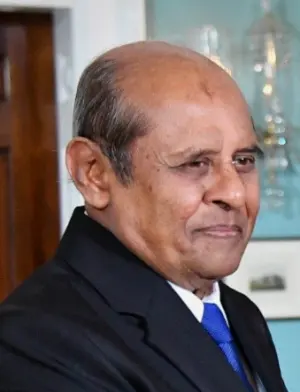 Tilak Marapana in suit