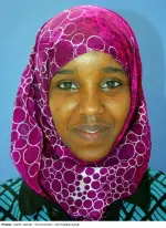 Yasmin Farah Hassan competing in table tennis at the 2012 Olympics