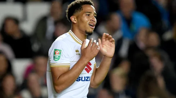 Sam Nombe playing football for Rotherham United