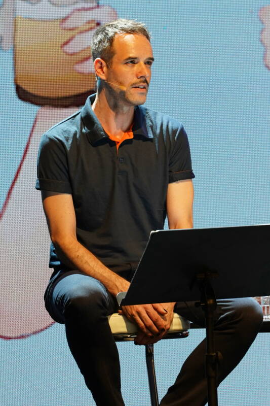 Thomas Smolej performing on stage in Slovenia