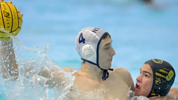 Rebecca Kershaw playing water polo in a match