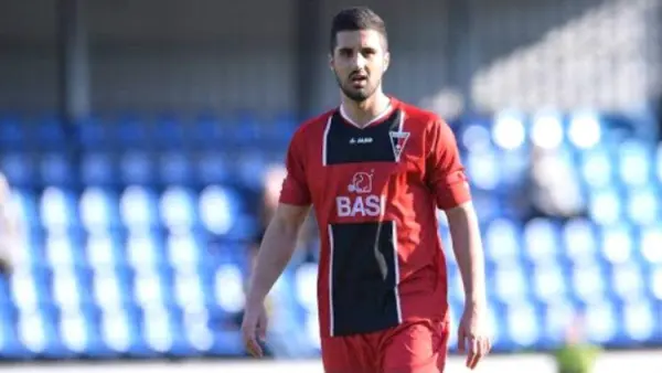 David Azin playing football