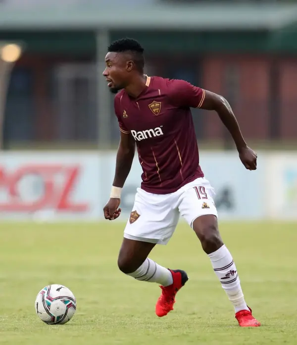 Nathan Sinkala playing football for Zambia