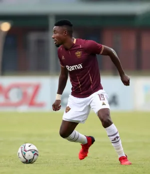 Nathan Sinkala playing football for Zambia
