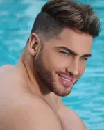 Henry Licett posing for a fashion photoshoot