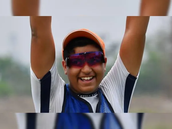 Shardul Vihan Indian sport shooter holding a medal