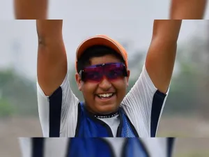 Shardul Vihan Indian sport shooter holding a medal