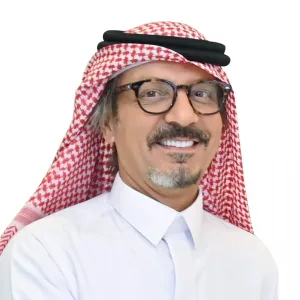Khaled Al-Hamdhi playing football on the field