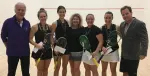 Stephanie Edmison playing squash in a professional match