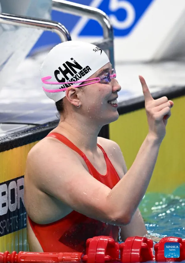 Wang Xueer Chinese swimmer competing in backstroke event