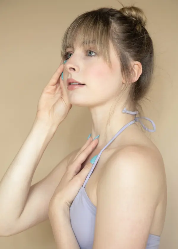 Ballet By Heather demonstrating a classical ballet pose in a studio setting