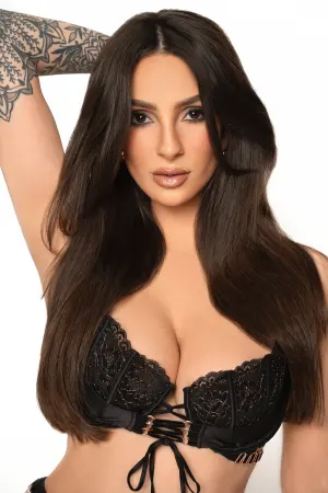 Portrait-style image of OnlyFans creator Isamobella (goodwithmytongue) posing with a confident, polished aesthetic.