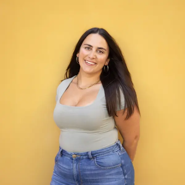 Jamie Pappas, American digital creator and comedian, posing for social media content.