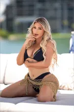Kayley Gunner posing confidently for a lifestyle and fashion photo