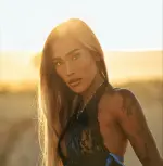 Portrait of Kira TS, a Thailand-based trans digital creator known for her fashion-forward aesthetic