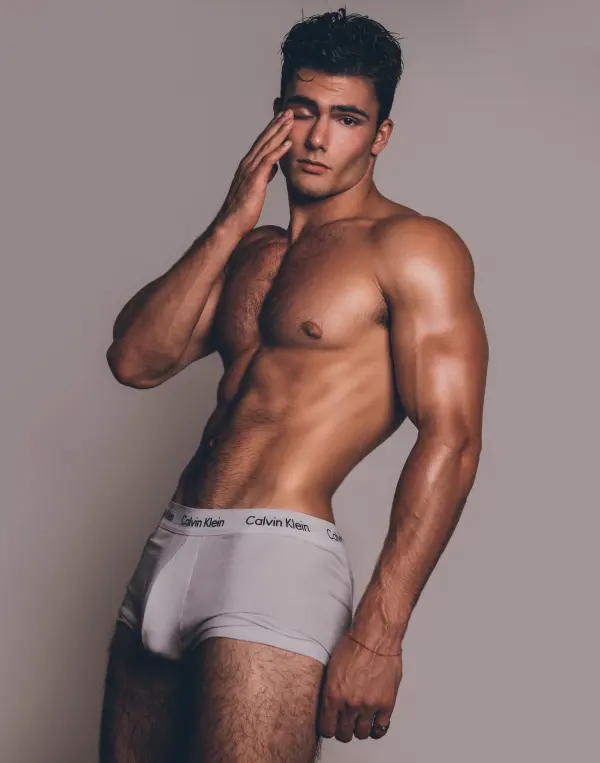 Levi Conely, American fitness model and OnlyFans creator, posing with confident expression