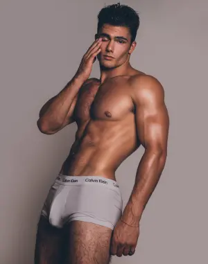 Levi Conely, American fitness model and OnlyFans creator, posing with confident expression