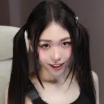 Meriol Chan posing for a creative photoshoot, known as meriolchanfree on OnlyFans.