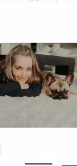 Michelle and her French Bulldog Mila posing for social media content