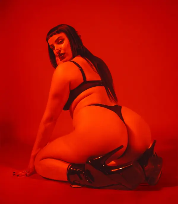 Portrait-style representation of Nyx, the creator behind nyxxx_at_night, featuring an alternative and moody aesthetic.