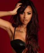 Paula DeAnda posing confidently, blending music and modern influencer style