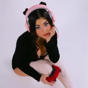 Portrait of Tiff, known as player2tiff, a gaming-inspired OnlyFans creator and digital personality.