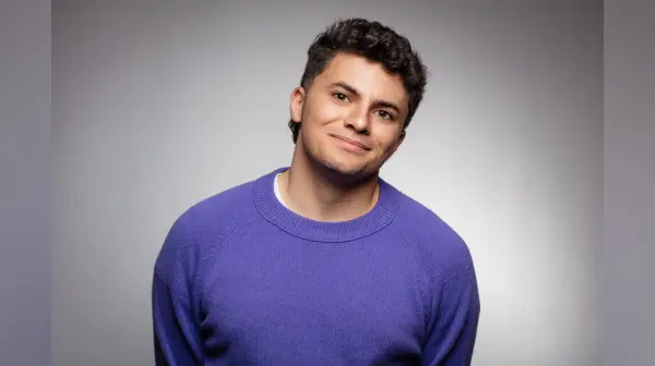 Portrait of Simon Fraser, the comedian and digital creator known as simonloveshighnoons