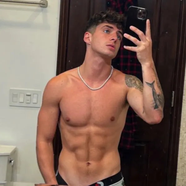 Zach Clayton posing confidently for a lifestyle photo on Instagram