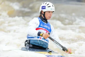 Katarína Macová competing in wildwater canoeing event