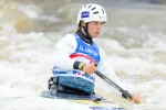 Katarína Macová competing in wildwater canoeing event