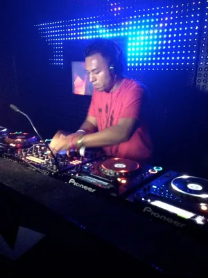 DJ IDeaL performing live at an electronic music festival