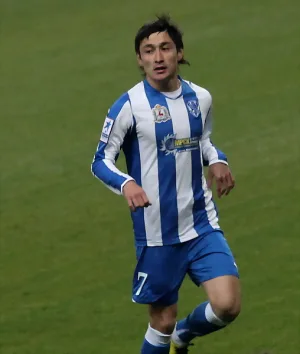 Sanzhar Tursunov playing football for Uzbekistan