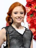 Barbara Meier smiling at a red carpet event