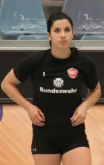 Janie Guimond playing volleyball on the court