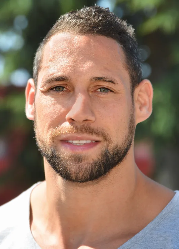 Luke McAlister playing rugby for the All Blacks