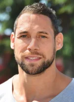 Luke McAlister playing rugby for the All Blacks