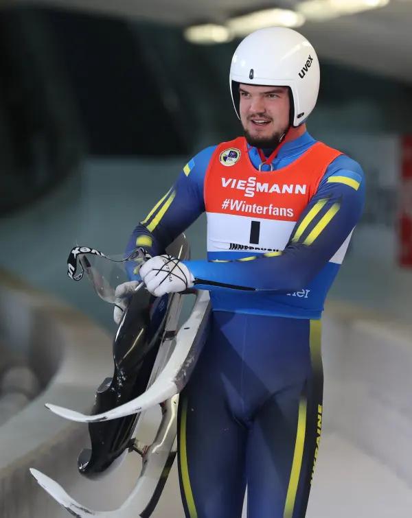 Anton Dukach competing in luge at the Winter Olympics