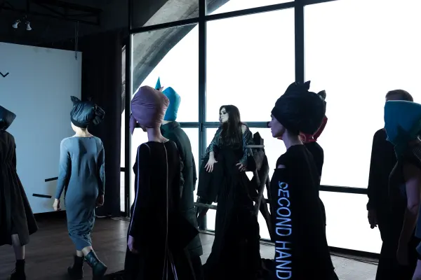 Alexandra Kutas modeling in high fashion attire