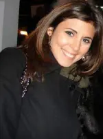 Jamie-Lynn Sigler smiling at a red carpet event