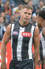 Dan Houston playing for Port Adelaide in the AFL