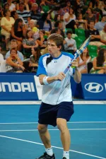 Igor Andreev playing tennis on clay court